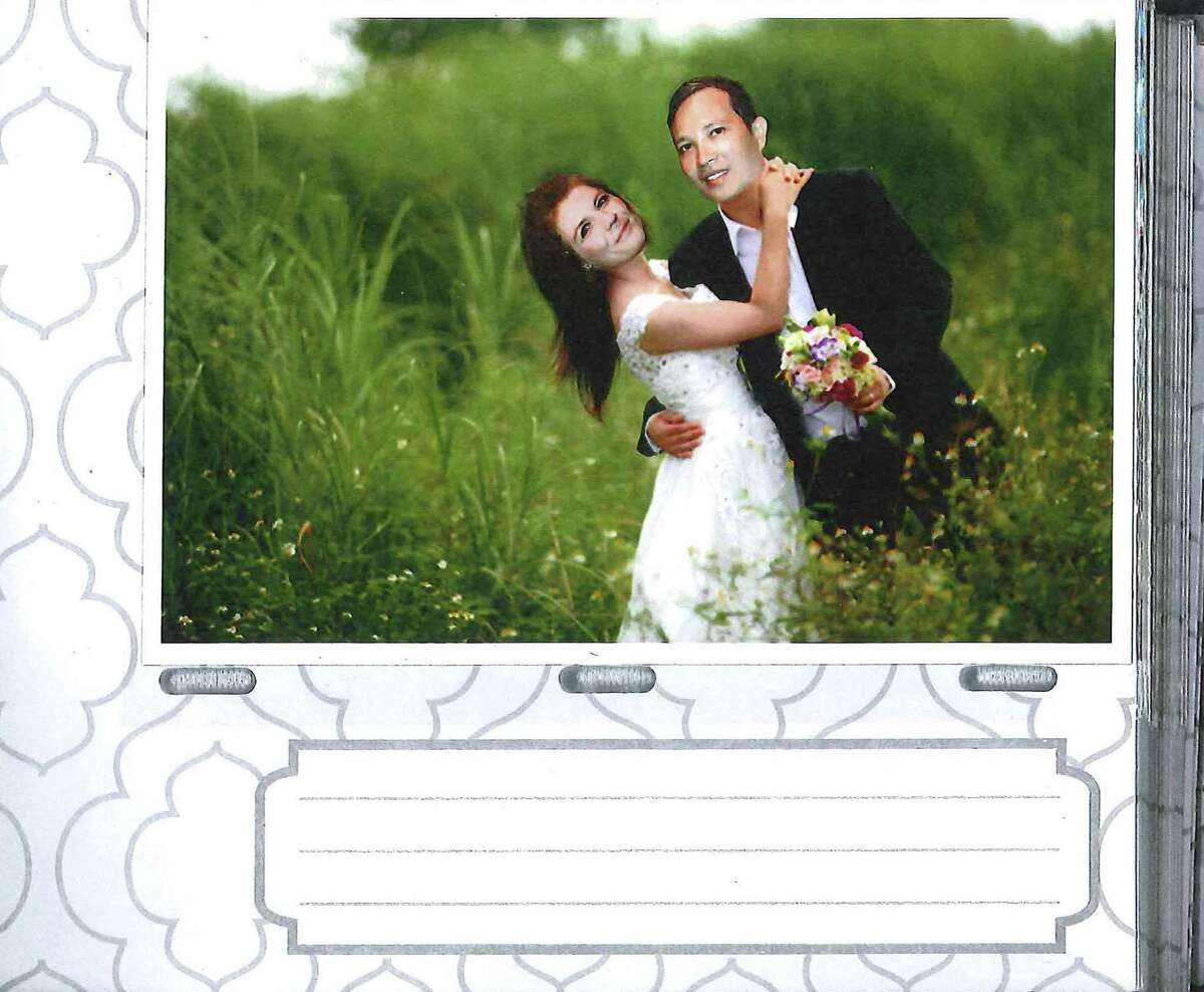 Photo from a wedding album of Nam Phuon Hoang and Brandy Lynn Esley. Photo albums were submitted as evidence by federal prosecutors.