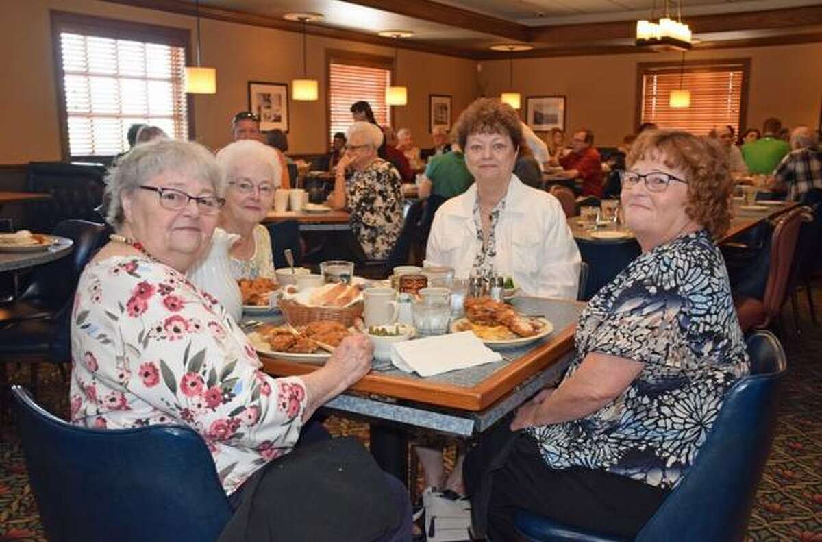 Mary Harris, of Godfrey, second from right, and members of her family enjoy the All-Star Restaurant Week special at Castelli’s at 255.