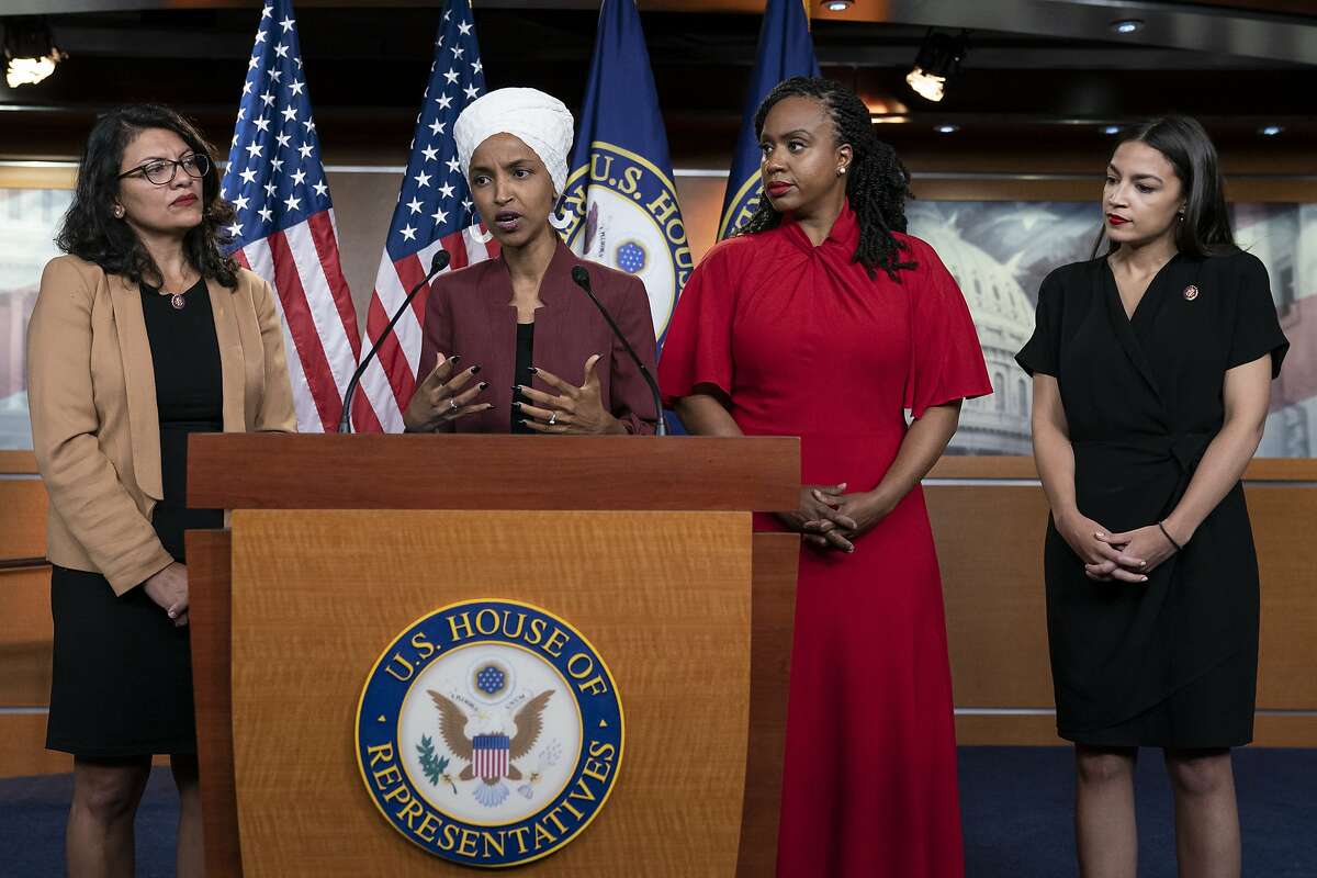 From left, U.S. Reps. Rashida Tlaib, D-Mich., Ilhan Omar, D-Minn., Ayanna Pressley, D-Mass., and Alexandria Ocasio-Cortez, D-N.Y., respond to base remarks by President Donald Trump after he called for four Democratic congresswomen of color to go back to their "broken" countries, as he exploited the nation's glaring racial divisions once again for political gain, during a news conference at the Capitol in Washington, Monday, July 15, 2019. All four congresswomen are American citizens and three of the four were born in the U.S. Omar is the first Somali-American in Congress. (AP Photo/J. Scott Applewhite)