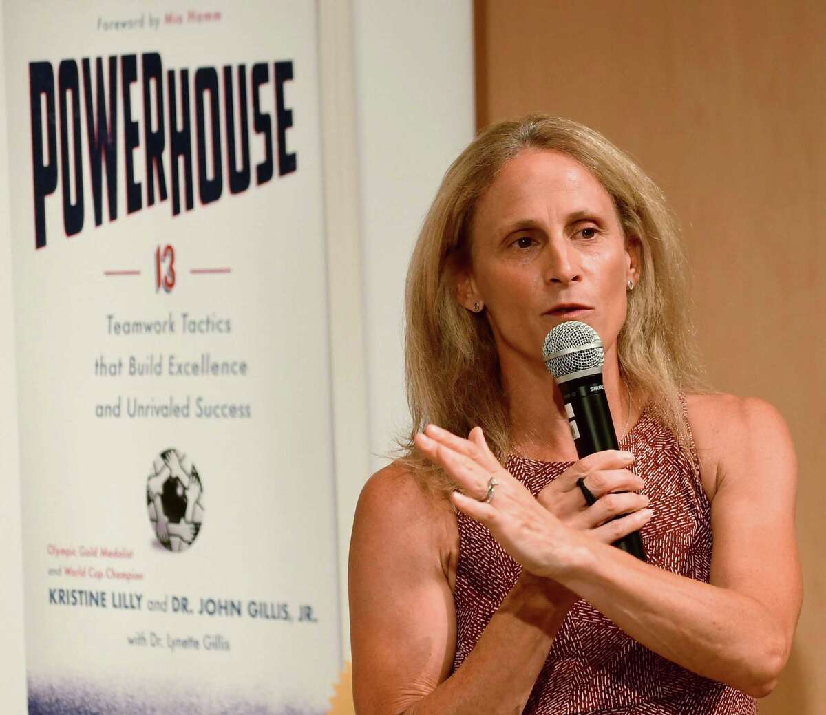 Wilton High School graduate and soccer star Kristine Lilly speaks Tuesday, July 16, 2019, at Wilton Library in promotion of her new book, PowerHouse, in Wilton, Conn.
