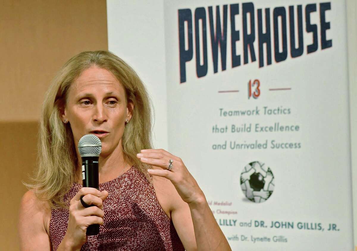 Wilton High School graduate and soccer star Kristine Lilly speaks Tuesday, July 16, 2019, at Wilton Library in promotion of her new book, PowerHouse, in Wilton, Conn.