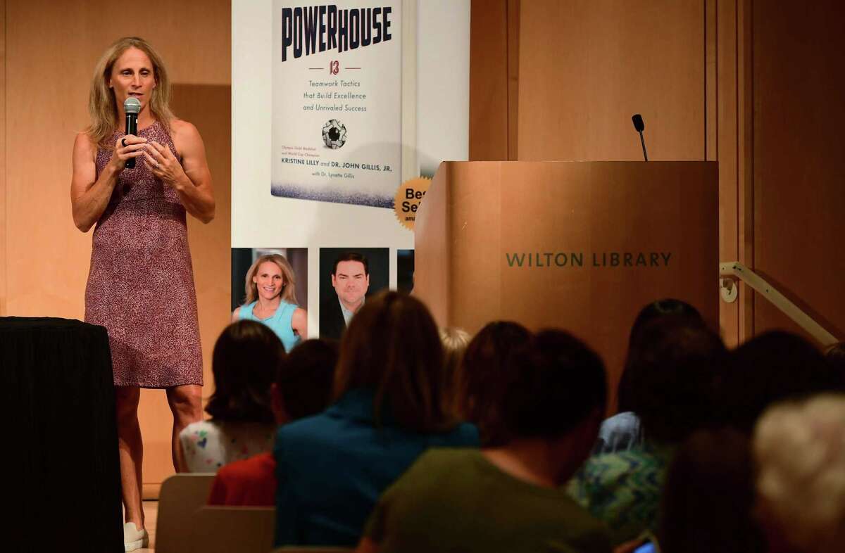 Wilton High School graduate and soccer star Kristine Lilly speaks Tuesday, July 16, 2019, at Wilton Library in promotion of her new book, PowerHouse, in Wilton, Conn.