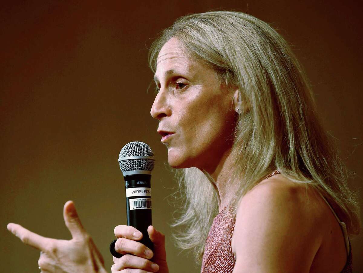 Wilton High School graduate and soccer star Kristine Lilly speaks Tuesday, July 16, 2019, at Wilton Library in promotion of her new book, PowerHouse, in Wilton, Conn.