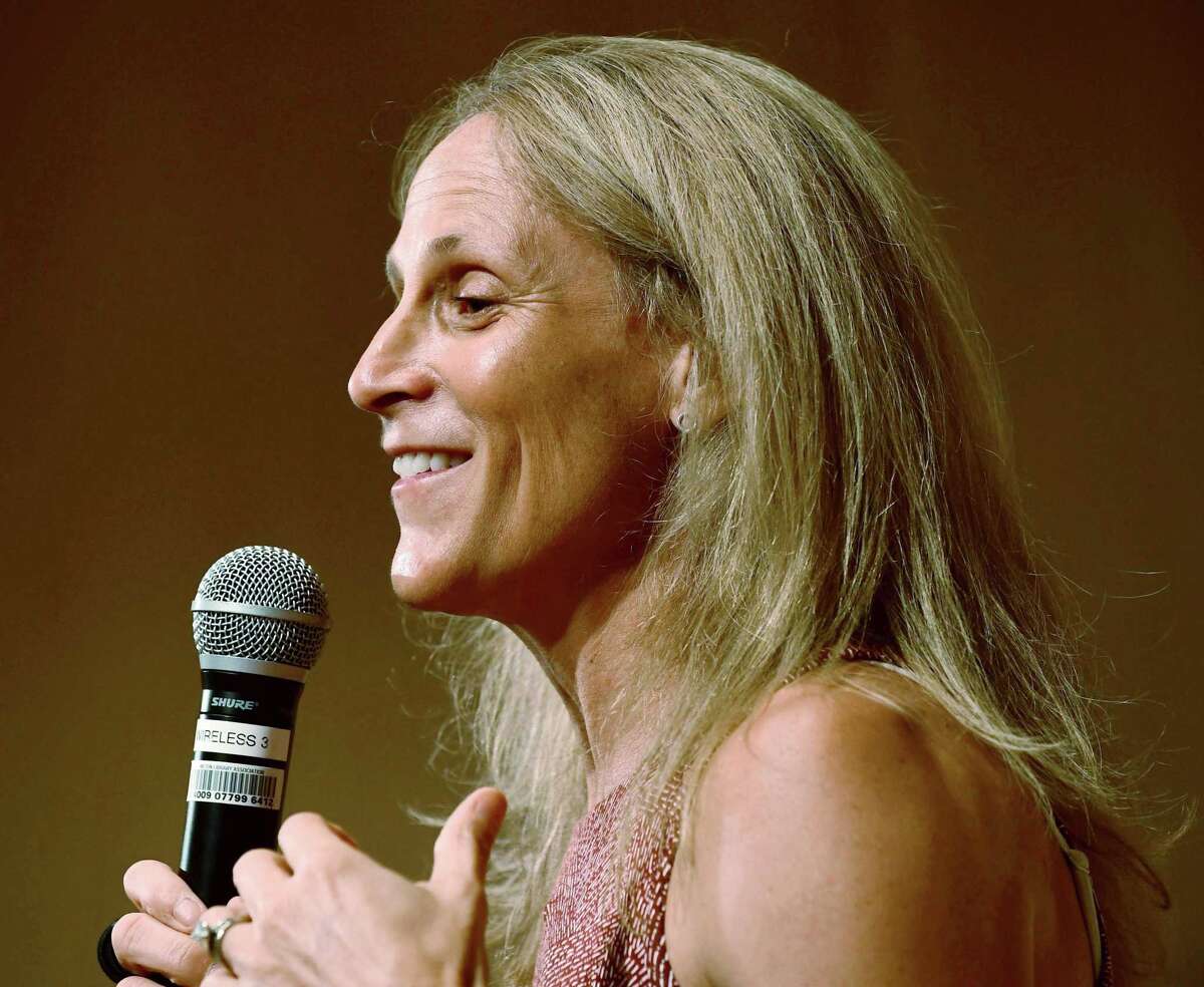 Wilton High School graduate and soccer star Kristine Lilly speaks Tuesday, July 16, 2019, at Wilton Library in promotion of her new book, PowerHouse, in Wilton, Conn.