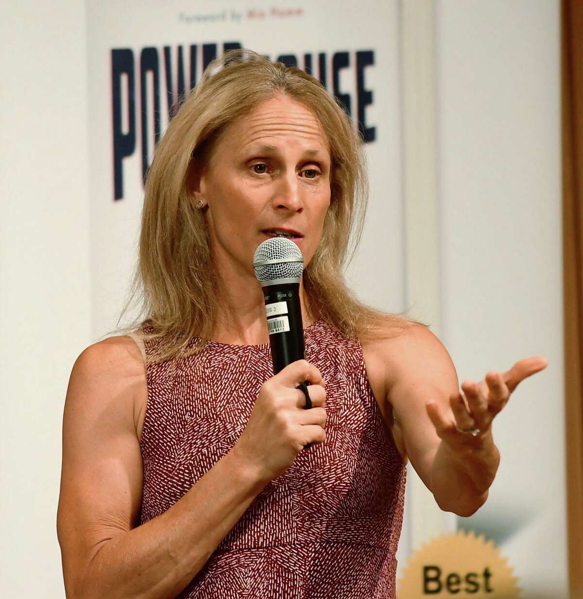 Wilton High School graduate and soccer star Kristine Lilly speaks Tuesday, July 16, 2019, at Wilton Library in promotion of her new book, PowerHouse, in Wilton, Conn.