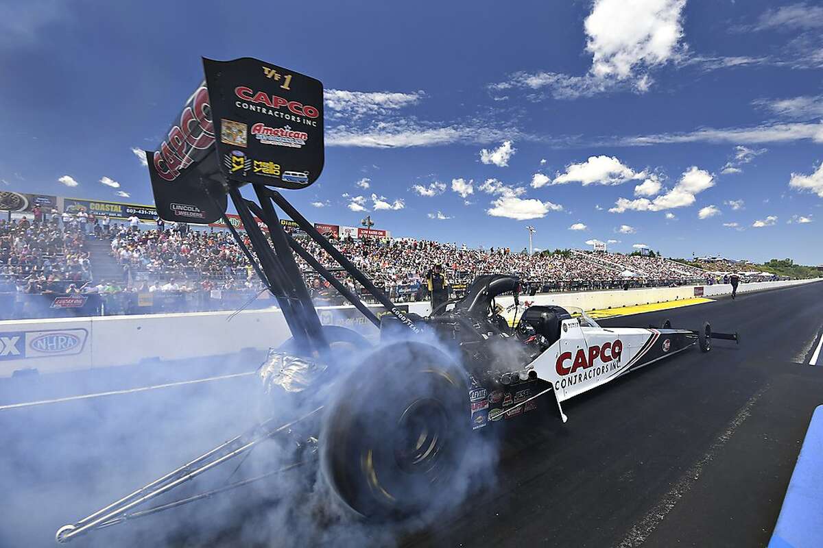 In this photo provided by the NHRA, Steve Torrence picked up his seventh win of the 2019 NHRA Mello Yello Drag Racing Series season when he defeated Scott Palmer in the final round at Sunday’s seventh annual NHRA New England Nationals with his lap of 3.861-seconds at 321.58 mph, Sunday, July 7, 2019, in Epping, N.H. (Marc Gewertz/NHRA via AP)