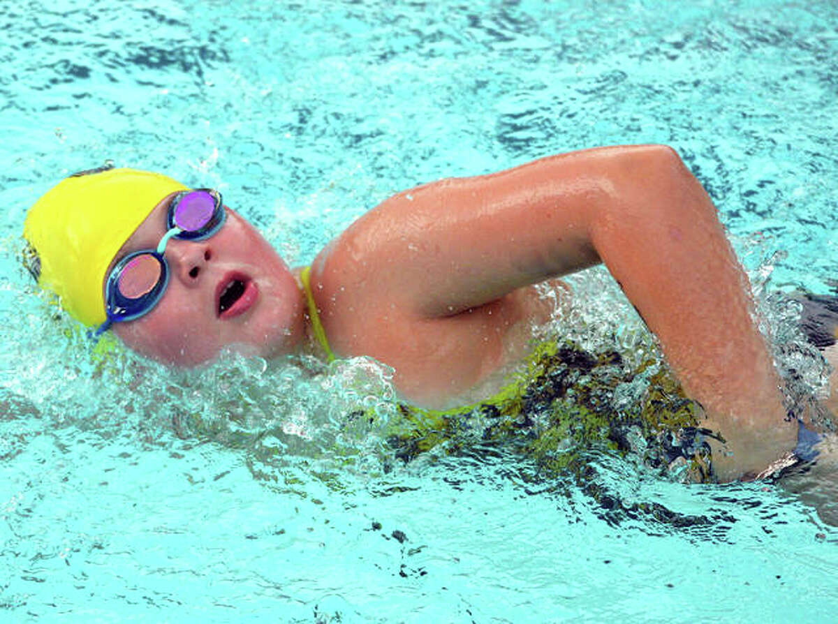Dylan Cohn from Sunset Hills swims in the girls 9-10 100-meter freestyle during Tuesday’s dual meet at Montclaire.