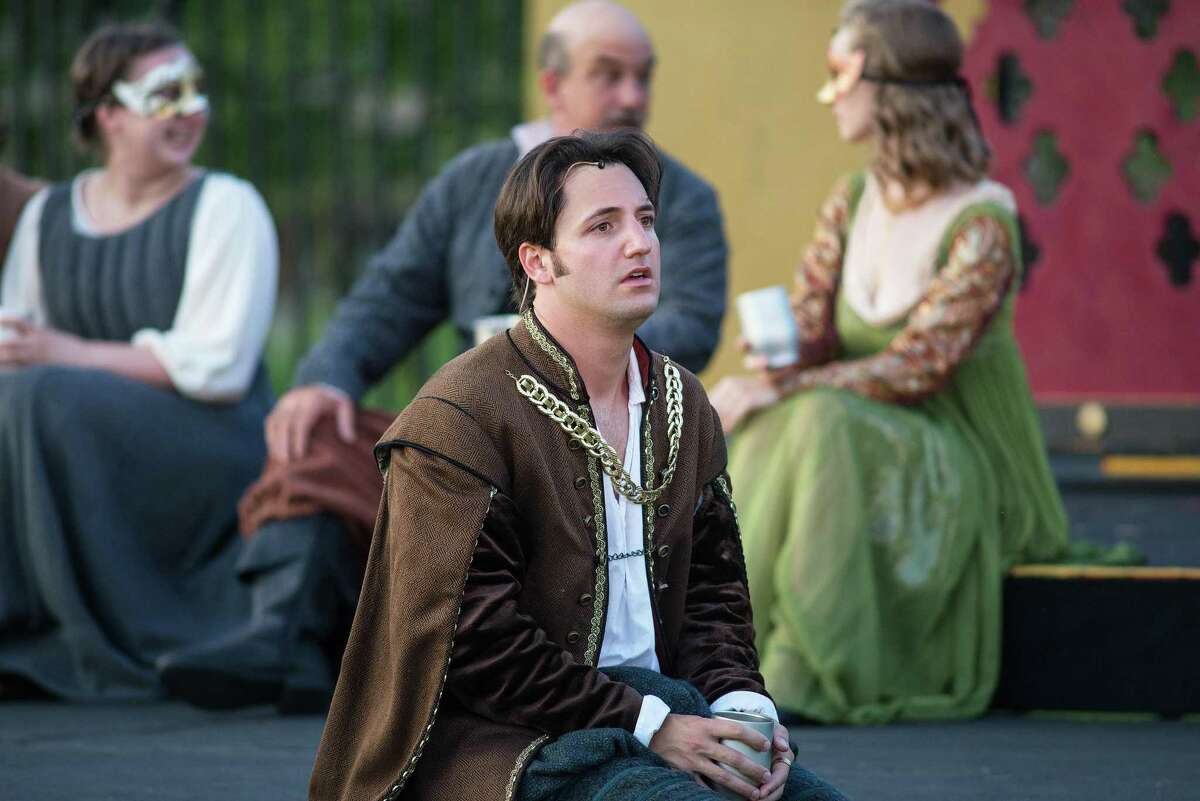 Melanie Byron (Ensemble Woman),Josh Johnston (Duke of Norfolk- foreground), Matthew Catalano (Lord Sands), Kate McMorran (Anne Bullen) in the Valley Shakespeare Festival performance of King Henry at the Veterans Memorial Riverwalk in Shelton, Connecticut on Sunday, July 14, 2019. Melanie Byron (Ensemble Woman),Josh Johnston (Duke of Norfolk- foreground), Matthew Catalano (Lord Sands), Kate McMorran (Anne Bullen) in the Valley Shakespeare Festival performance of King Henry at the Veterans Memorial Riverwalk in Shelton, Connecticut on Sunday, July 14, 2019.