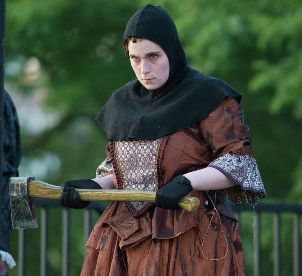 Aubrey Clinedinst plays the executioner in the Valley Shakespeare Festival’s performance of King Henry VIII at the Veterans Memorial Riverwalk Park in Shelton, Connecticut on Sunday, July 14, 2019 Aubrey Clinedinst plays the executioner in the Valley Shakespeare Festival’s performance of King Henry VIII at the Veterans Memorial Riverwalk Park in Shelton, Connecticut on Sunday, July 14, 2019