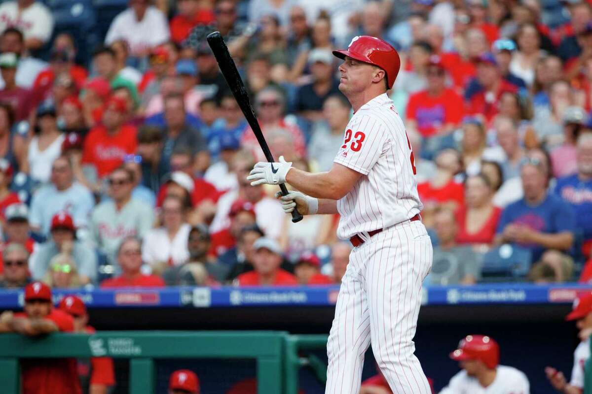 Philadelphia Phillies' Jay Bruce reacts after striking out against Los Angeles Dodgers starting pitcher Walker Buehler during the first inning of a baseball game, Tuesday, July 16, 2019, in Philadelphia. (AP Photo/Matt Slocum)