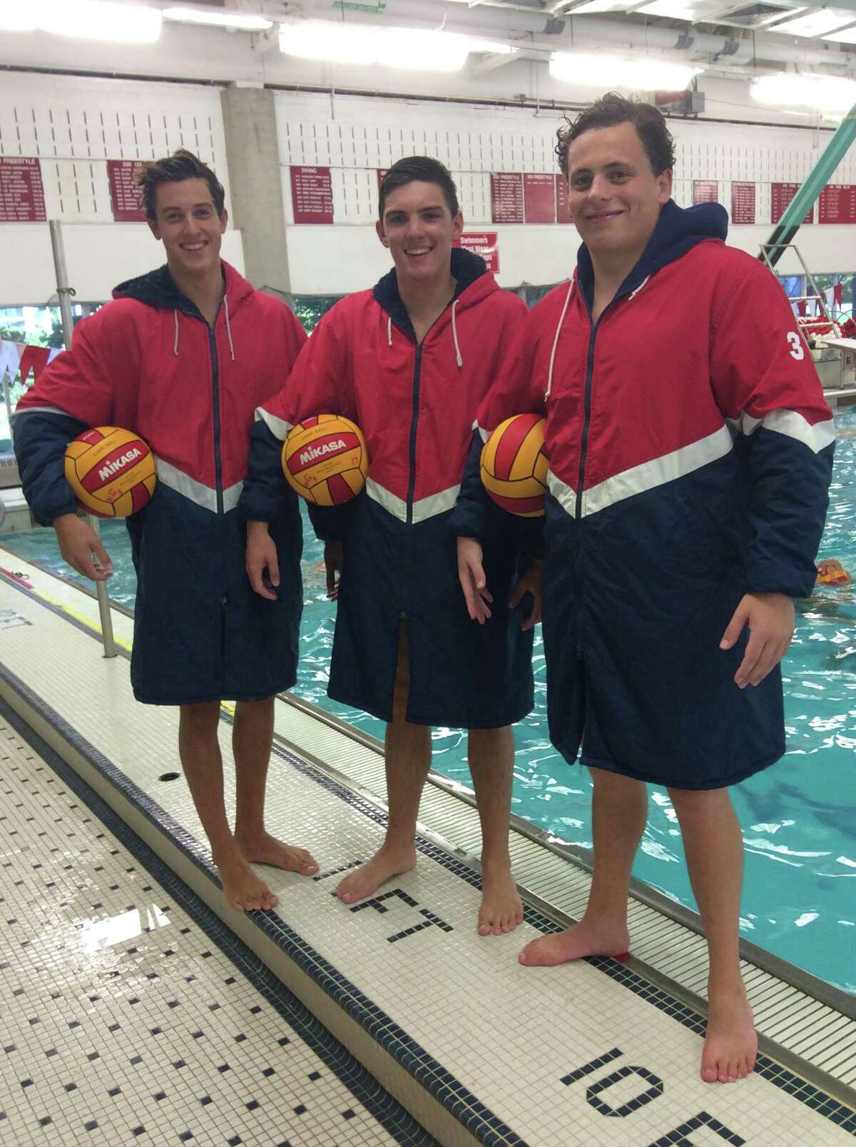 From left to right, Niki de la Sierra, Kyle Laufenberg and Tegan D’Agostino are senior captains on the Greenwich High School water polo team. September 4, 2018