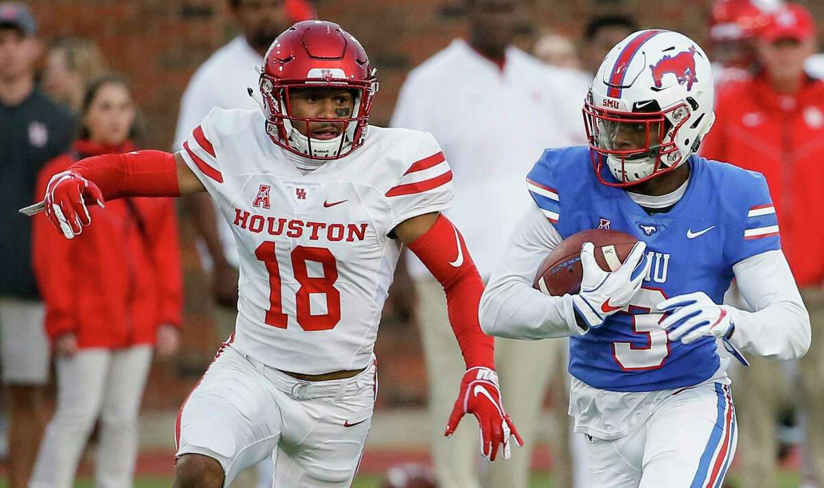 University of Houston cornerback Alexander Myres (18) pursues SMU wide receiver James Proche (3) during last year’s AAC matchup pitting former Southwest Conference rivals.