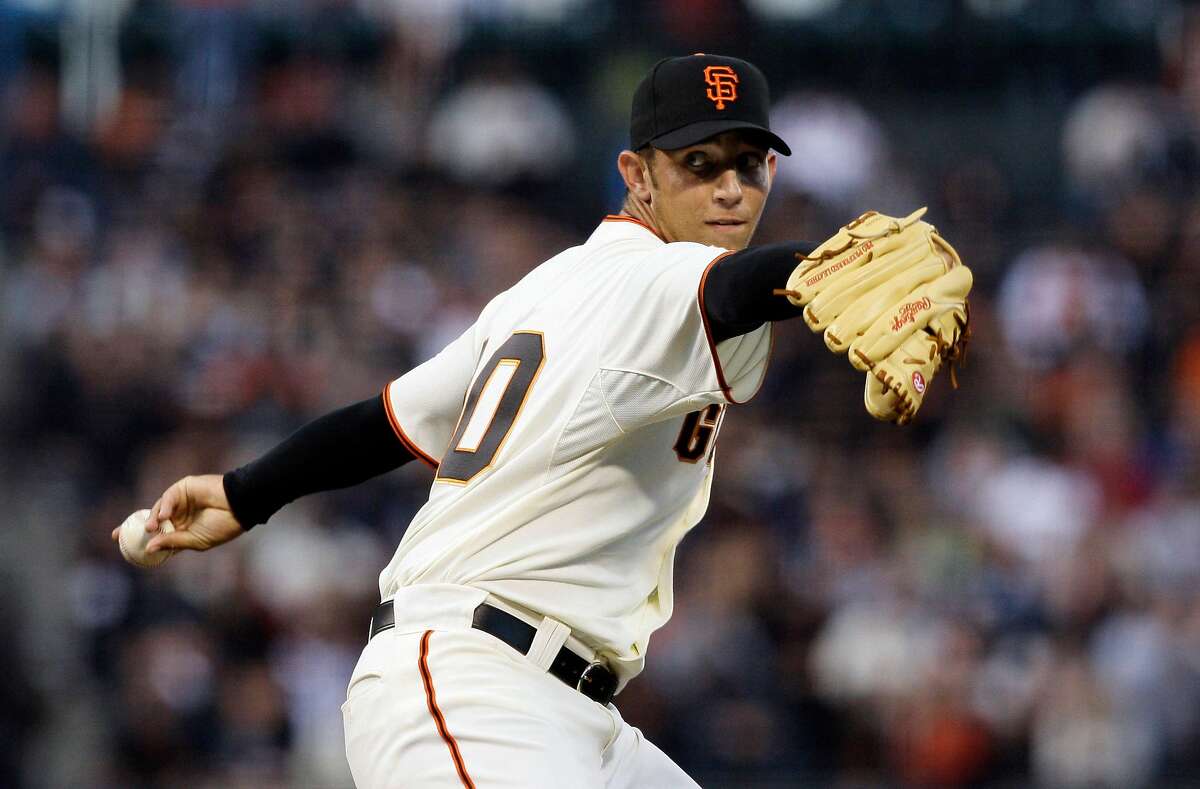San Francisco Giants' Madison Bumgarner pitches against the San Diego Padres in the first inning of a baseball game in San Francisco, Tuesday, Sept. 8, 2009. (AP Photo/Jeff Chiu)
