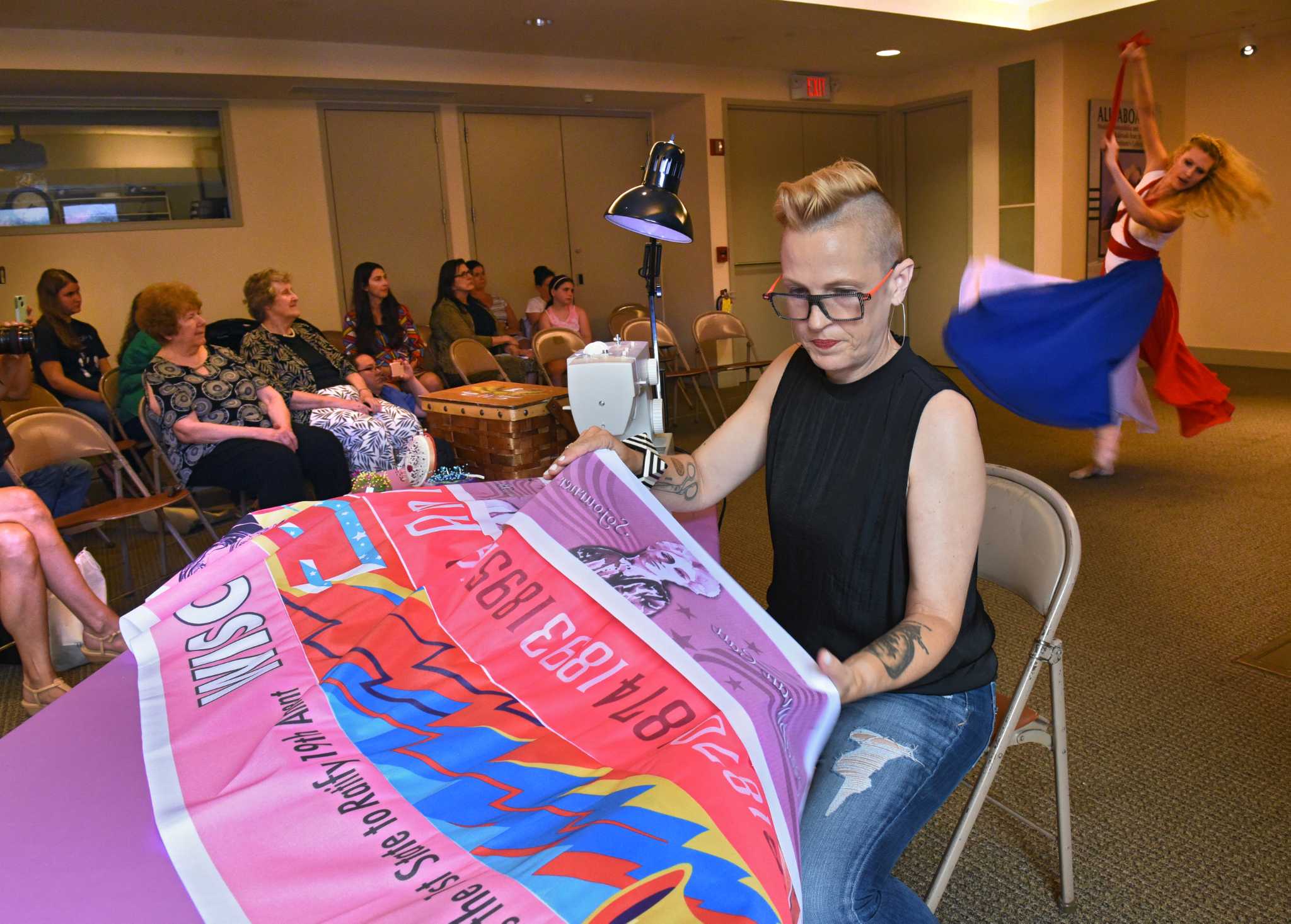 Photos Her Flag represents women's suffrage