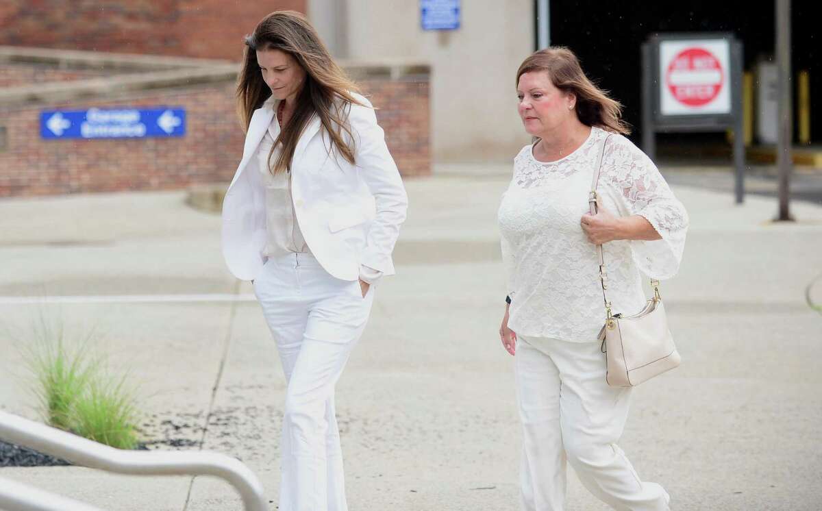 Michelle Troconis, left, arrives at the Stamford courthouse on Thursday with her mother, Marisela Arreaza.