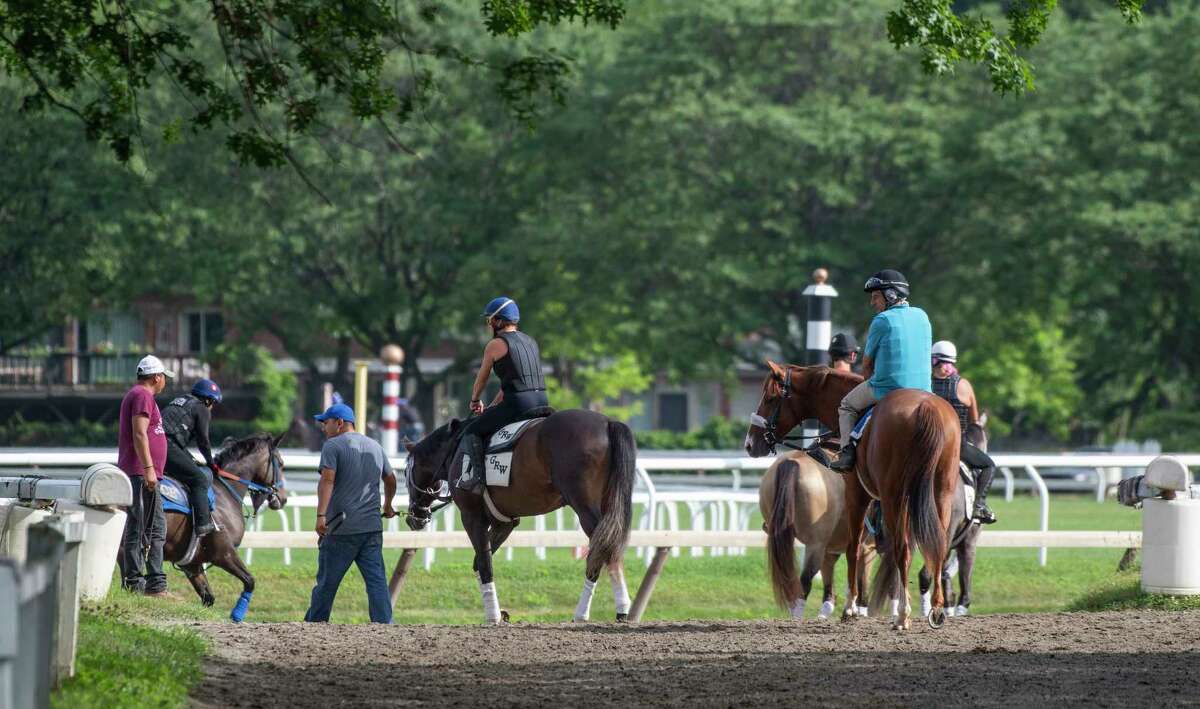 Horses head to the Oklahoma Training track adjacent to the Saratoga Race Course for morning exercise Thursday July 18 2019 in Saratoga Springs, N.Y. The opening of the training facility has been delayed this year because of the coronavirus outbreak. (Special to the Times Union by Skip Dickstein)