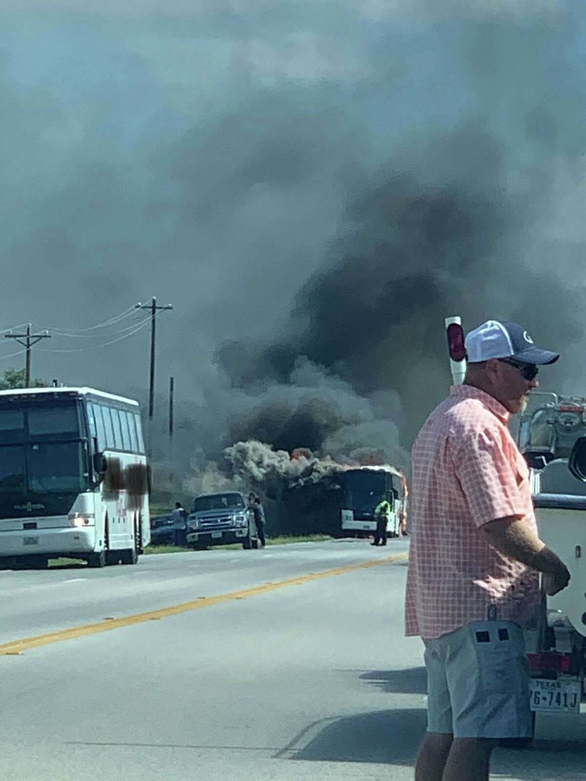 A charter bus headed to San Antonio engulfed in flames Thursday afternoon on U.S. Highway 281 near Ranch Road 1323 in Blanco County, the Blanco County Sheriff's Office confirmed.