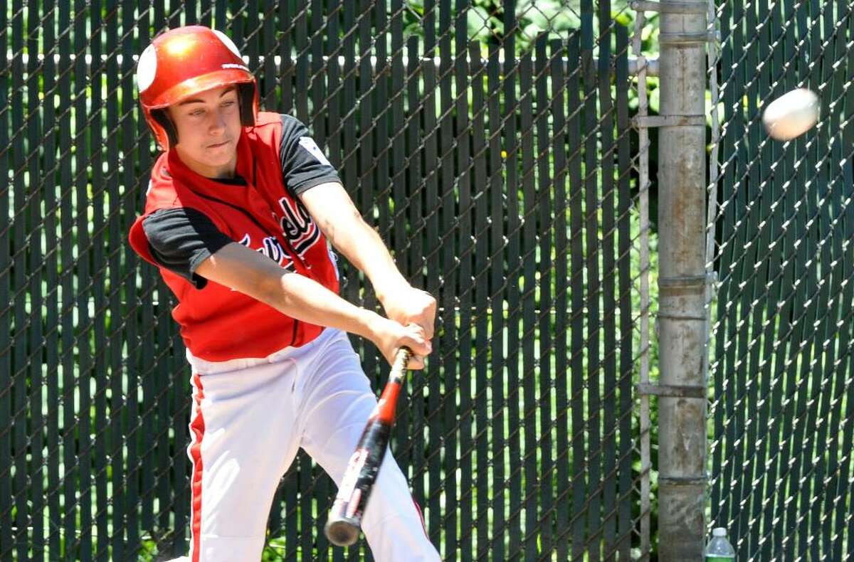 Fairfield American's Nick Nardone hits it out of the park during the all star little league game against Madison at Blackham School field in Bridgeport on Saturday, July 31, 2010.