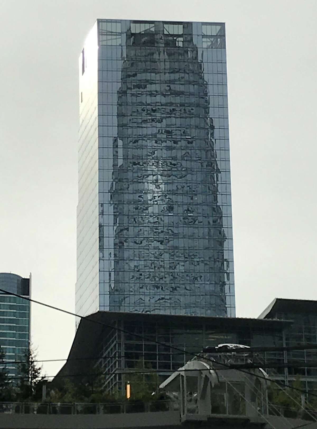 The Avery as seen from Mission Street on March 1, 2019, reflecting nearby Salesforce Tower.