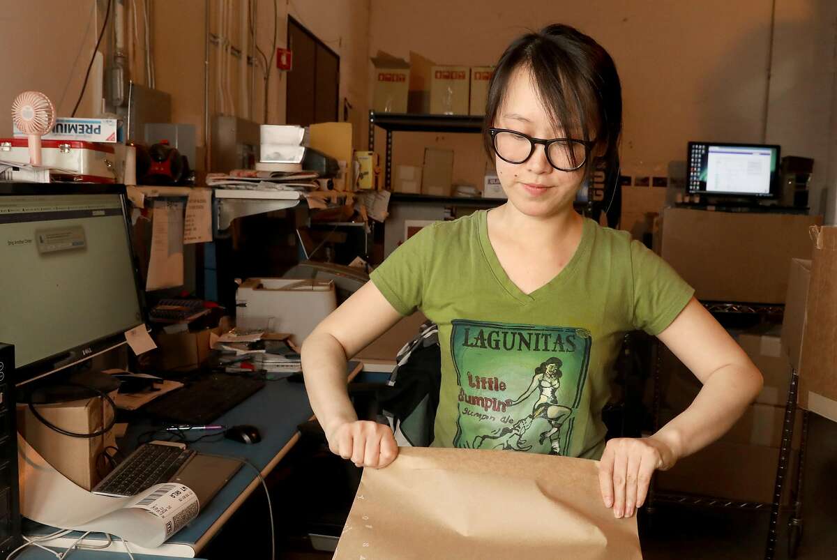Shipper Rachel Chen works in the shipping department of Sendosa on Wednesday, June 5, 2019 in Union City, Calif. A factory/mailing facility run by Sendoso sends packages of personalized swag.
