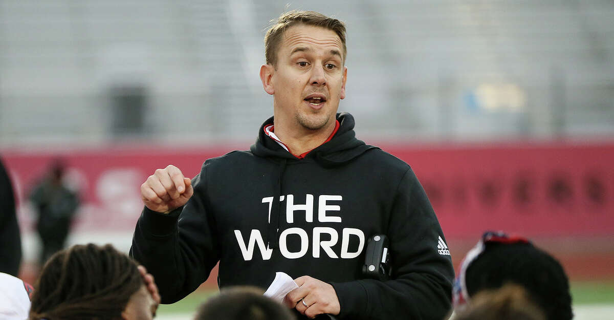 UIW head football coach Eric Morris talks to his team at the conclusion of the Cardinals' spring football game at Benson Stadium on Saturday, March 2, 2019.