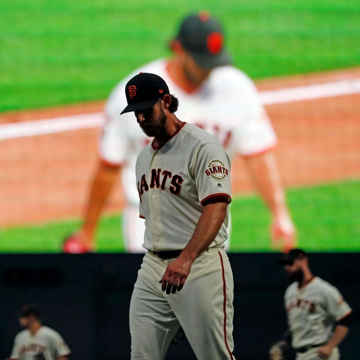 San Francisco Giants' Madison Bumgarner returns to the dugout after retiring the New York Mets' in 6th inning during MLB game at Oracle Park in San Francisco, Calif., on Thursday, July 18, 2019.