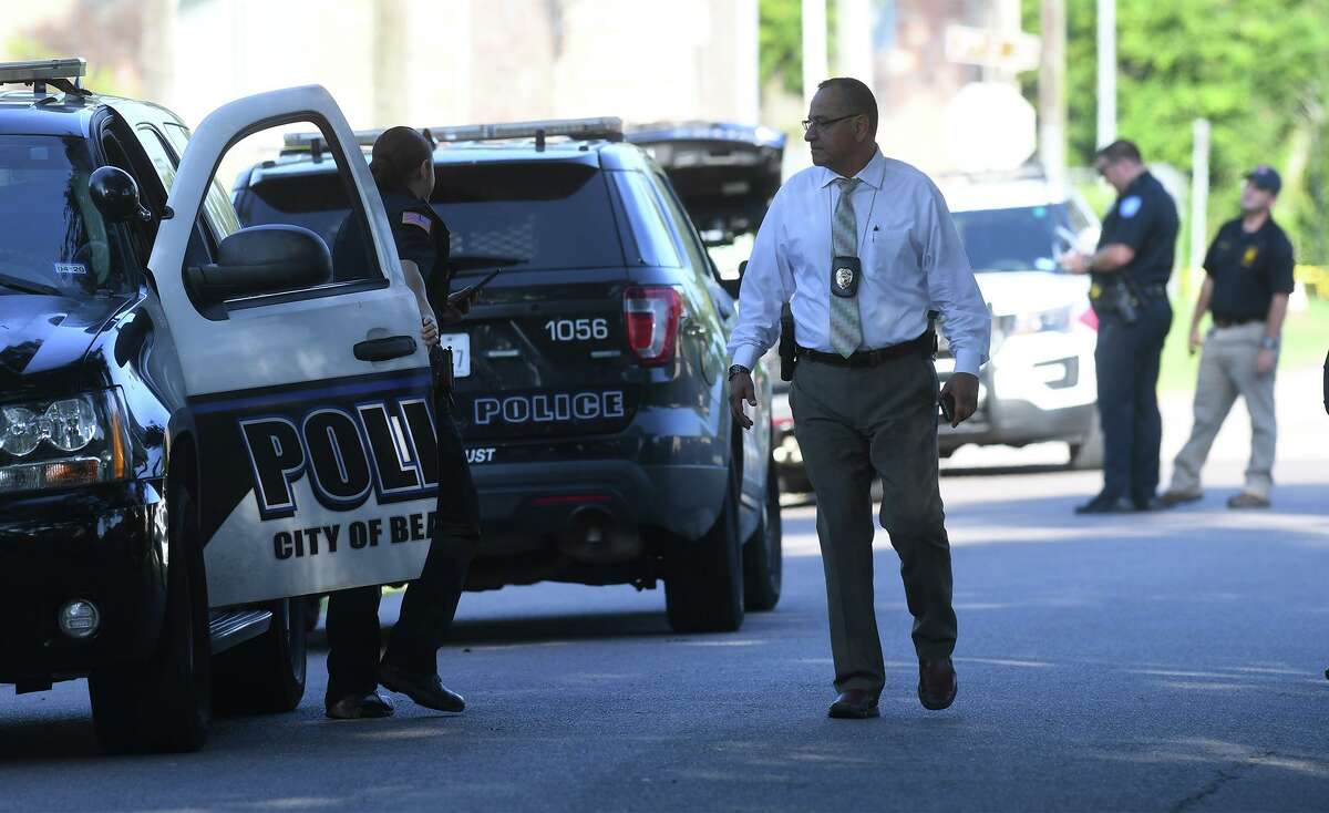 Beaumont Police investigate Thursday's homicide at a home on Evalon Avenue early Friday morning. A body was found by the home's tenant around 8 p.m. when a broken window was discovered. A small fire was also reported. Photo taken Friday, 7/19/19