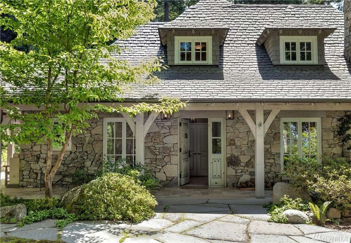 Enjoy a stunning, secluded 38 acres with this Freeland estate