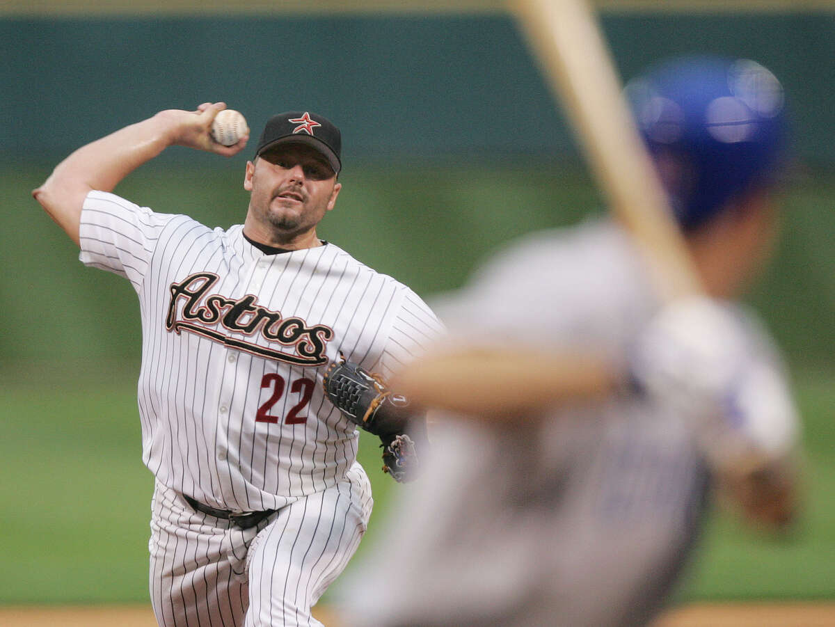 Astros starter Roger Clemens pitches to Cubs counterpart Greg Maddux on April 29, 2005, at Minute Maid Park. The matchup of 300-game winners was the first in the National League since 1892.