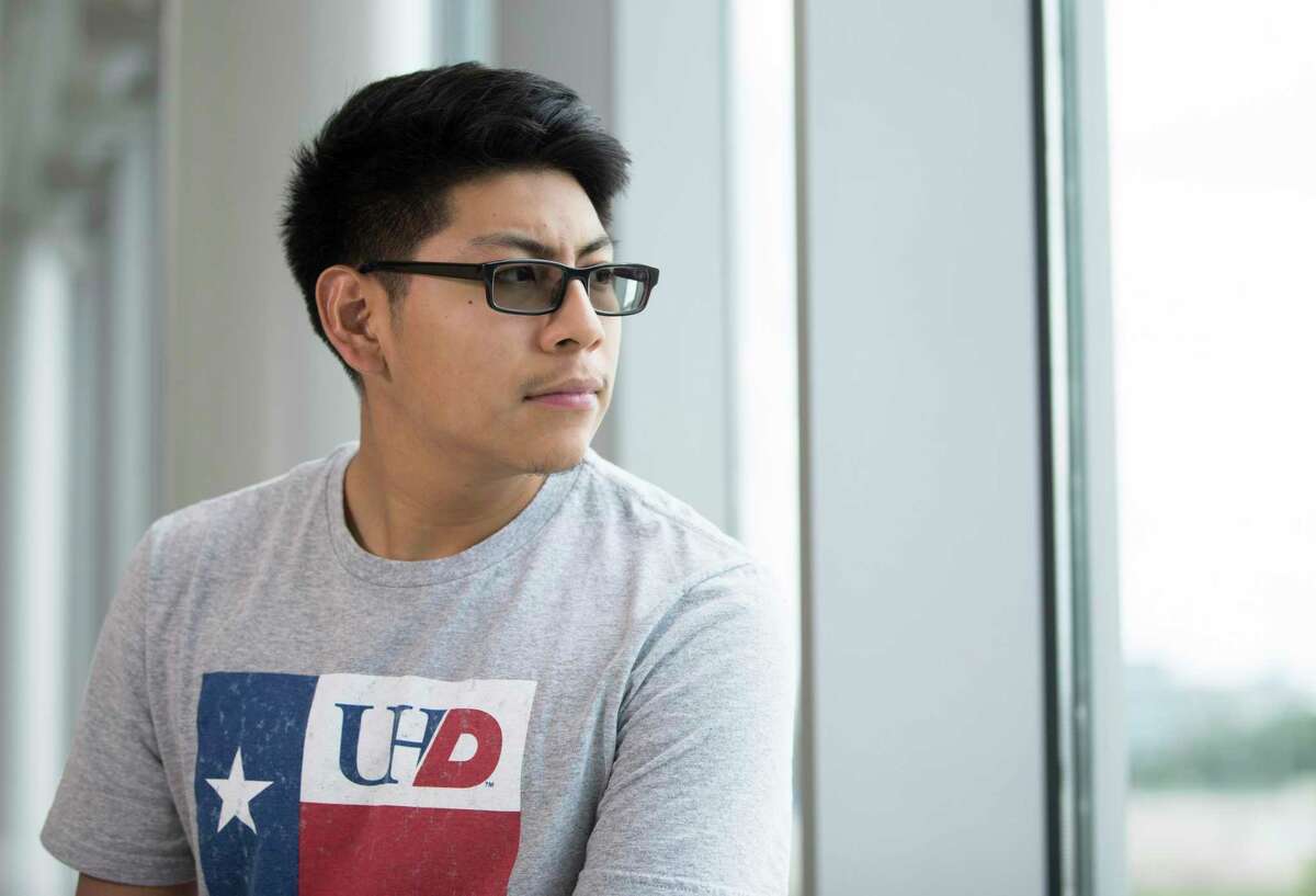 Carlos Casia, 20, a sophomore accounting major at University of Houston-Downtown, poses for a photograph on campus on Friday, July 19, 2019, in Houston. Casia is benefited from the college's Gator Pledge, which covers tuition and fees for students whose family has an income of $50,000 or less.