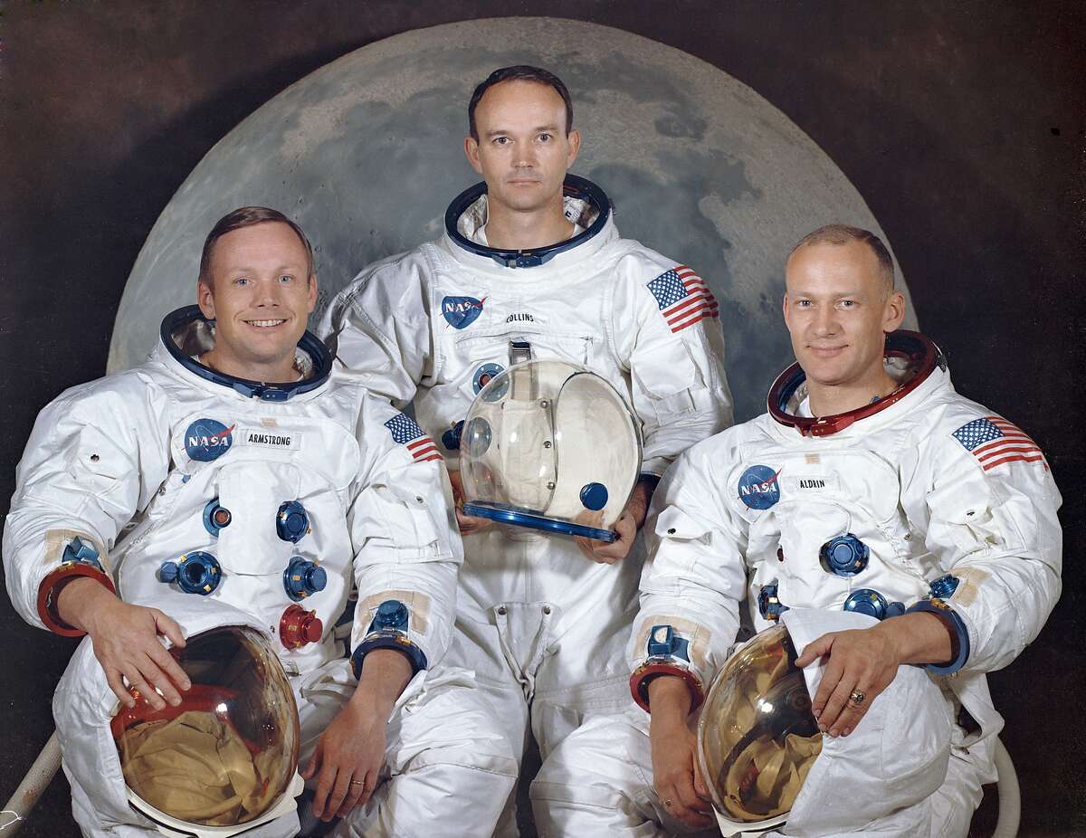 This March 30, 1969 photo made available by NASA shows the crew of the Apollo 11, from left, Neil Armstrong, commander; Michael Collins, module pilot; Edwin E. "Buzz" Aldrin, lunar module pilot. Apollo 11 was the first manned mission to the surface of the moon. (NASA via AP)