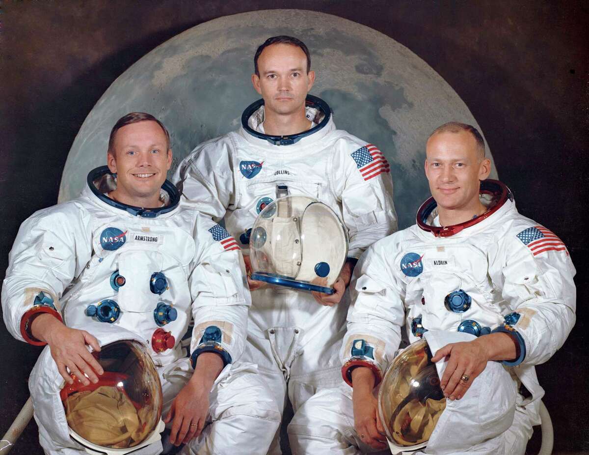 This March 30, 1969 photo made available by NASA shows the crew of the Apollo 11, from left, Neil Armstrong, commander; Michael Collins, module pilot; Edwin E. "Buzz" Aldrin, lunar module pilot.