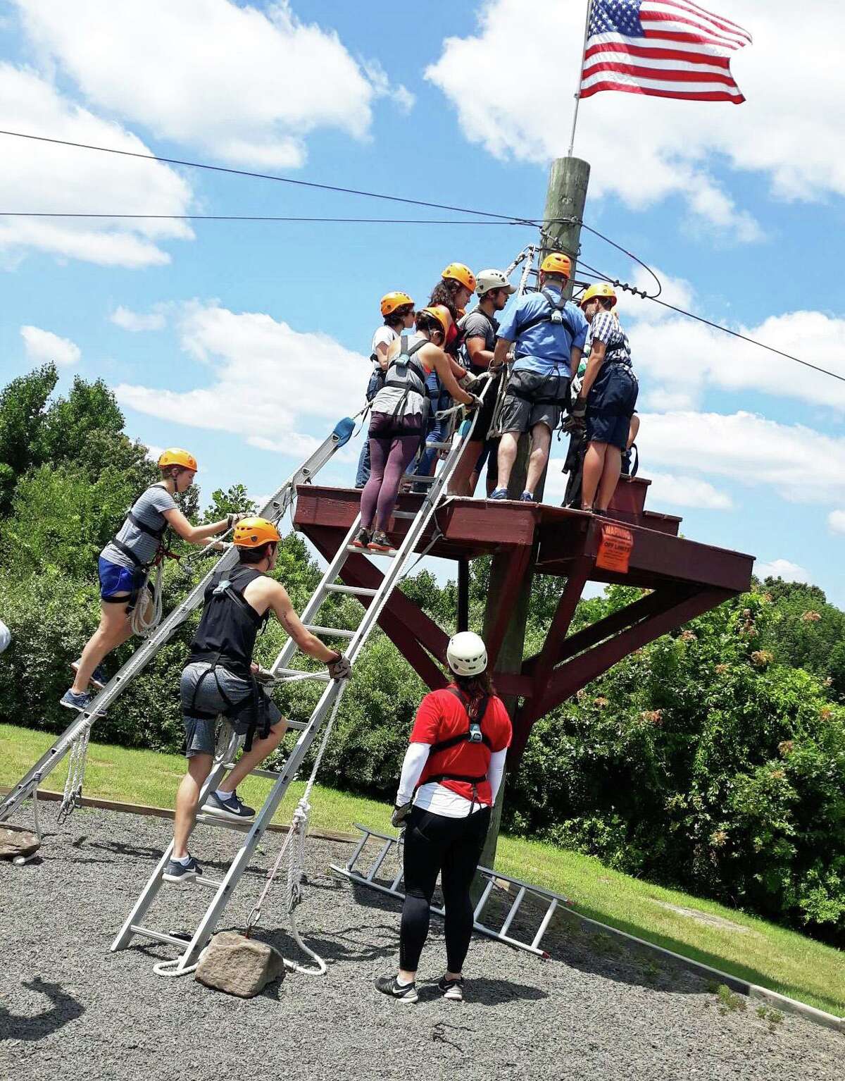 Eleven adults and young people participants visited Empower Leadership Sports and Adventure Center in Middletown July 13 for a warm weather session of zip lining as part of a Nutmeg Big Brothers Big Sisters’ program.