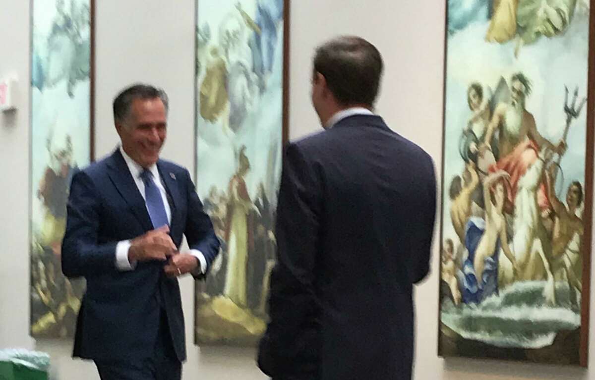 U.S. Senator Chris Murphy (D-CT), right, introduces Senator Mitt Romney (R-UT), at Connecticut in the Capital day last week in Washington, D.C.