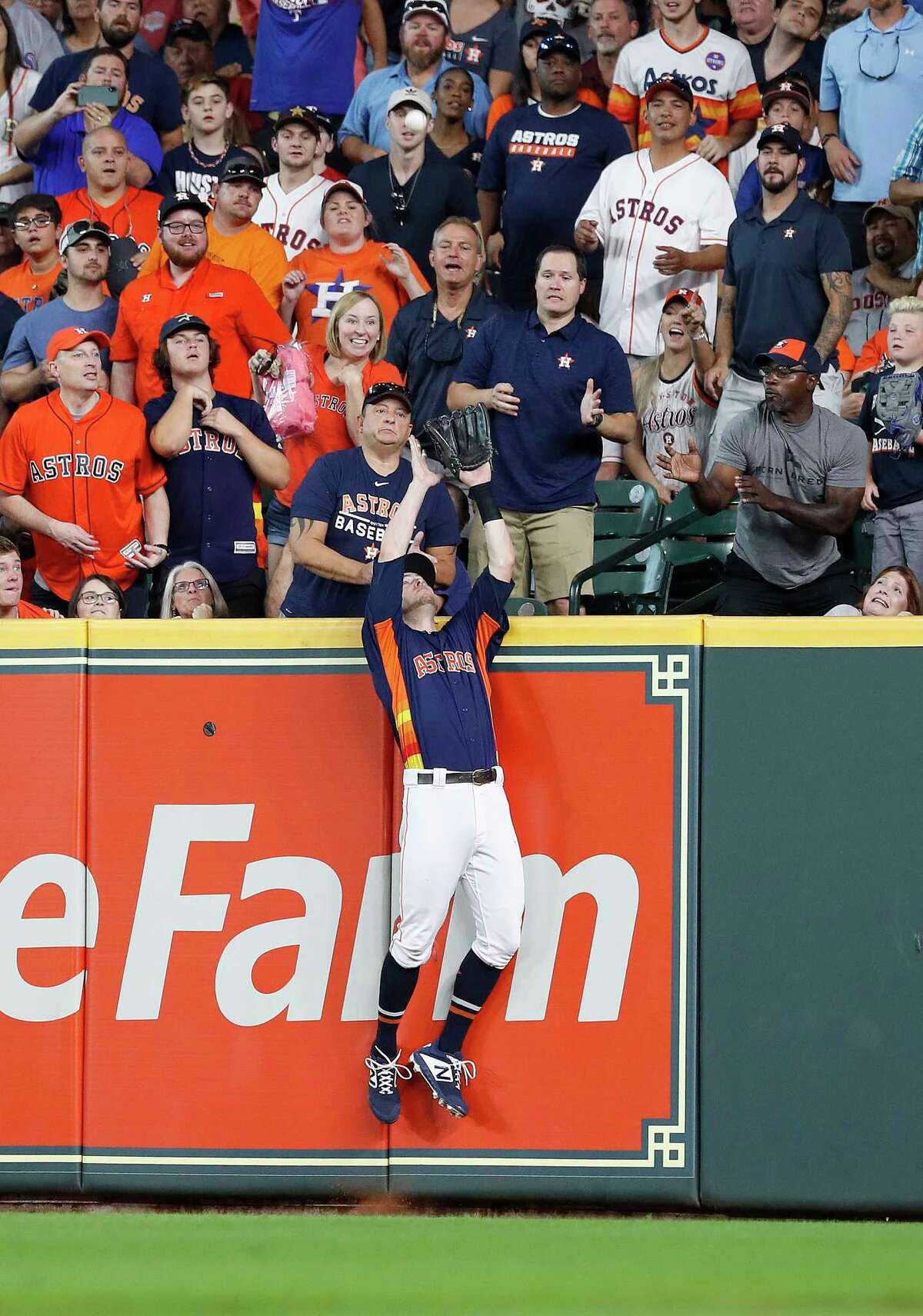 Michael Brantley homers twice, Astros hang on to sweep Rangers