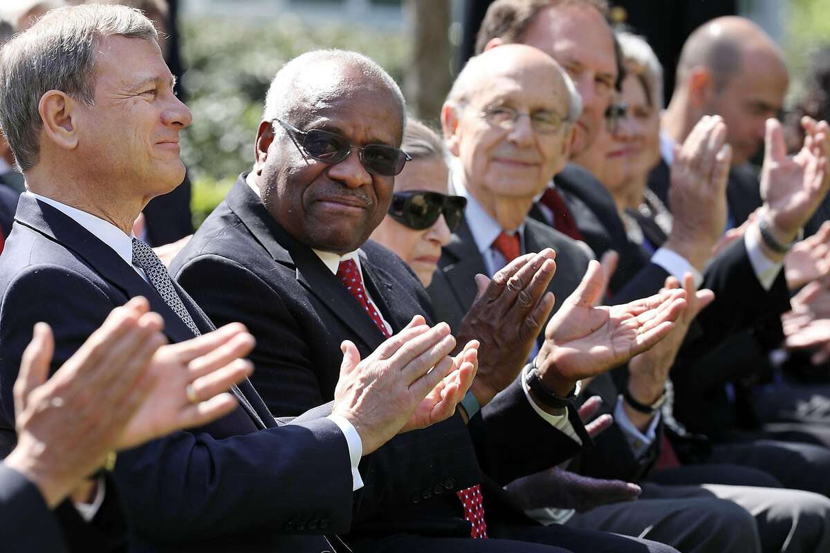 WASHINGTON, DC - APRIL 10: (L-R) U.S. Supreme Court Chief Justice John Roberts and associate justices Clarence Thomas, Ruth Bader Ginsburg, Stephen Breyer and Samuel Alito attend the ceremony where Judge Neil Gorsuch takes the judicial oath during a cere