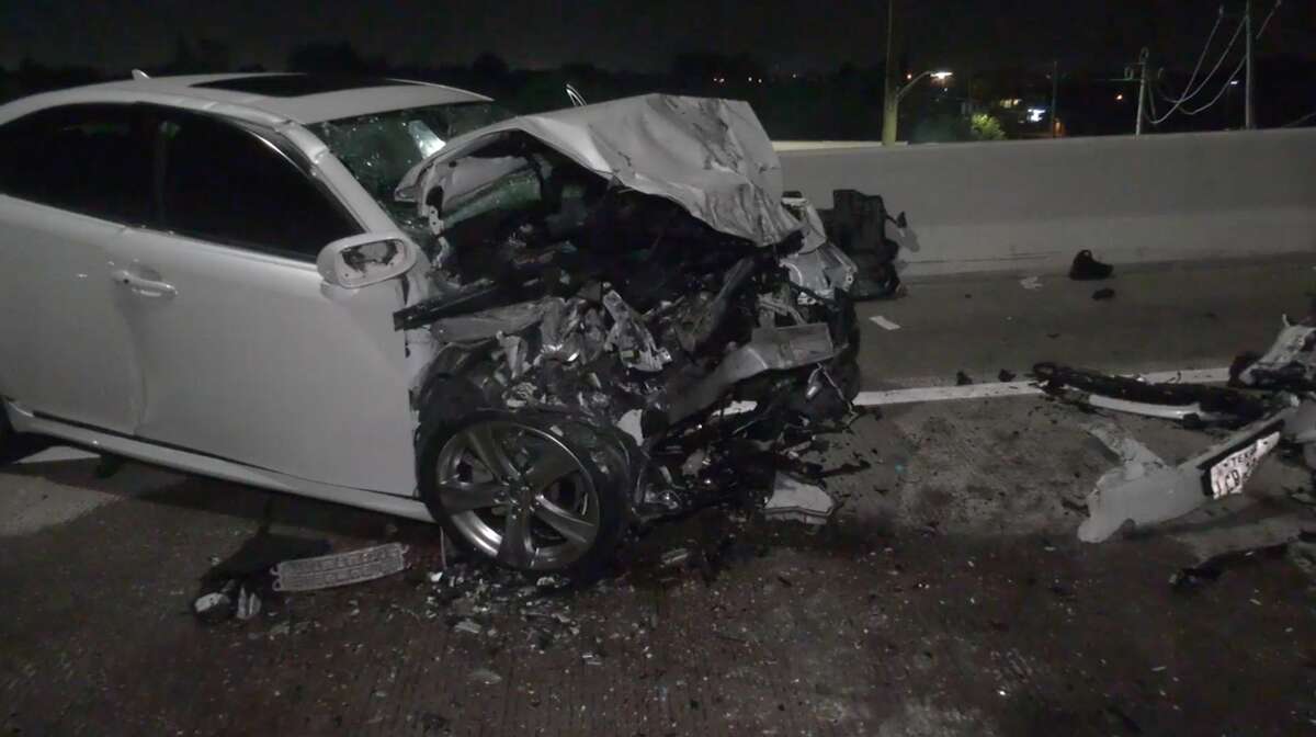Harris County Sheriff's Office deputies investigate a deadly crash where a sheriff's office patrol car transporting a DWI suspect was hit head-on by another suspected drunk driver Sunday, July 21, 2019. The DWI suspect in the patrol car died en route to the hospital, while all others involved in the crash suffered non-life-threatening injuries.