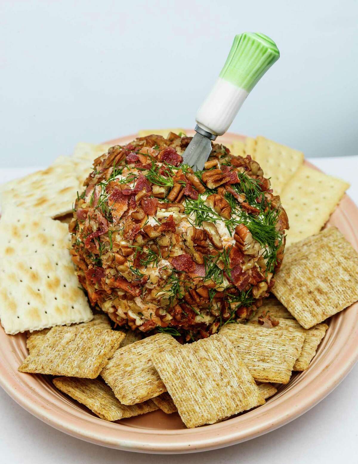 Dill Pickle Cheese Ball employs both pickle juice and chopped dill pickles.