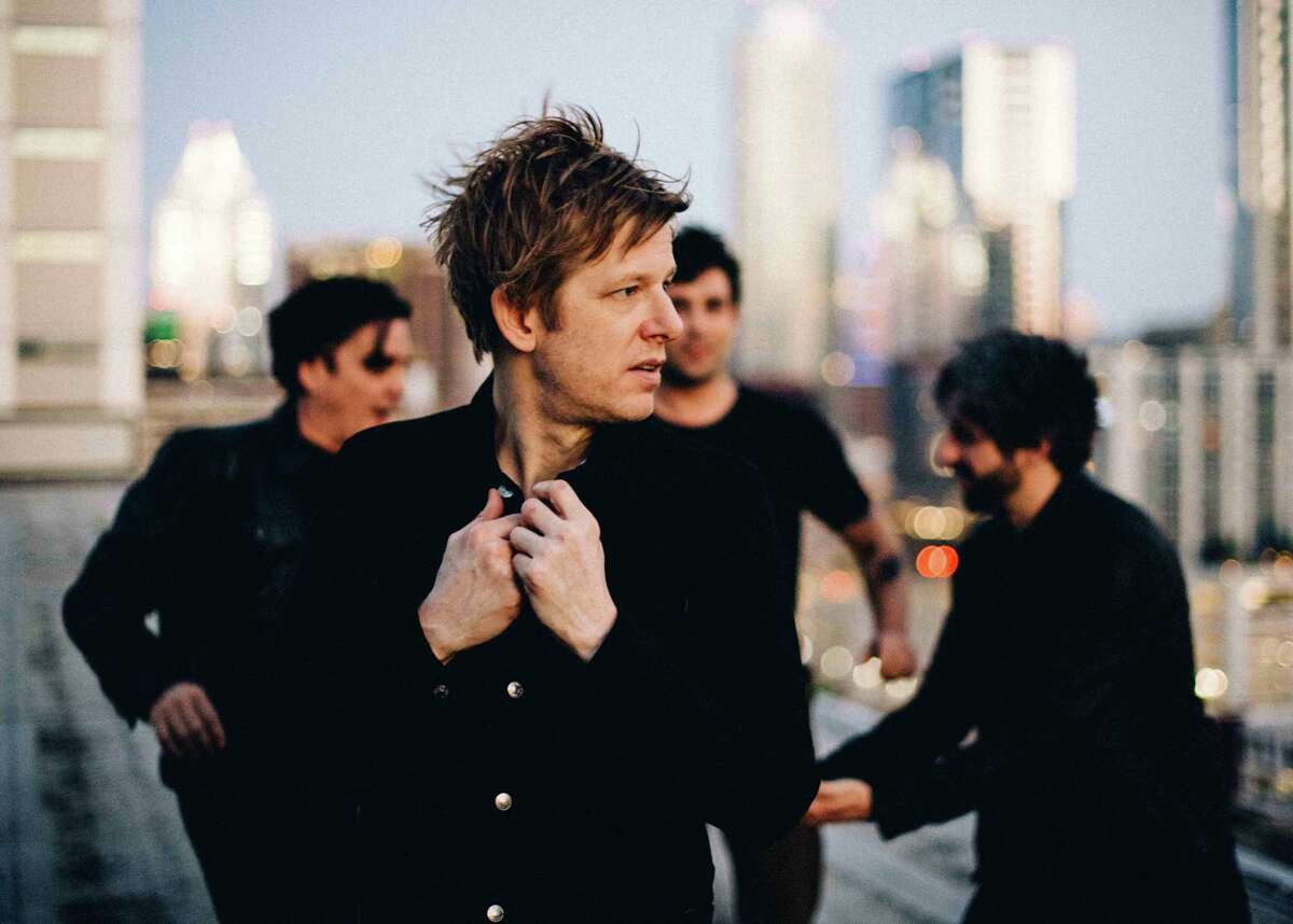 For more than 20 years rock band Spoon has included Jim Eno (left) and Britt Daniel (foreground)