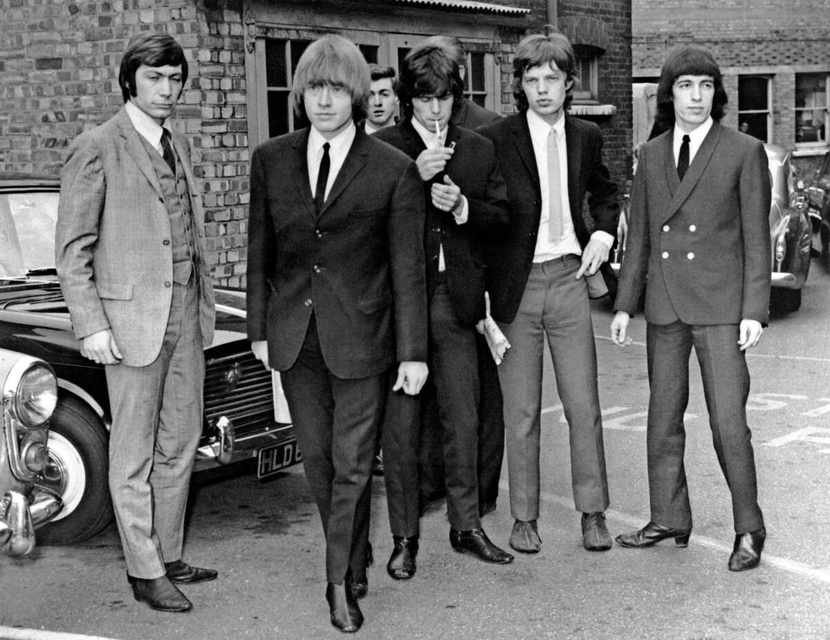 TO GO WITH AFP STORY BY JAMES PHEBY (FILES) A file picture taken in London, on July 22, 1965, shows members of the Rolling Stones band (L-R) Charlie Watts, Brian Jones, Keith Richards, Mick Jagger and Bill Wyman. Most London shoppers rush by 165 Oxford Street without a second glance -- but it was here 50 years ago that The Rolling Stones played their first gig and changed the landscape of pop music forever. Mick Jagger, Keith Richards and Brian Jones played The Marquee Club on July 12, 1962 with three others, the first time they performed under the band name which would become synomymous worldwide with excess and muscial flair. AFP PHOTO /FILES-/AFP/GettyImages