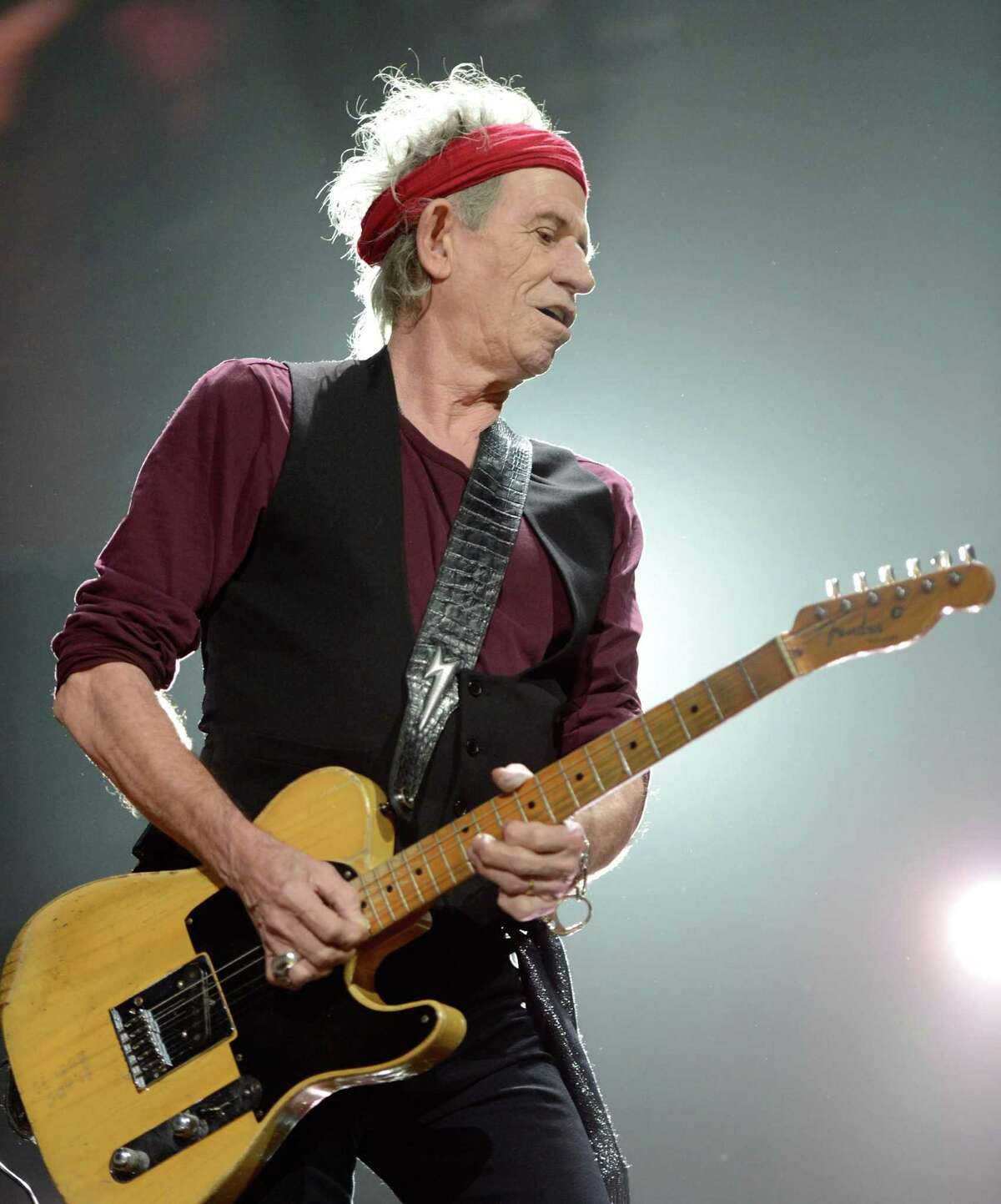 NEW YORK, NY - DECEMBER 12: Keith Richards of The Rolling Stones performs at "12-12-12" a concert benefiting The Robin Hood Relief Fund to aid the victims of Hurricane Sandy presented by Clear Channel Media & Entertainment, The Madison Square Garden Company and The Weinstein Company at Madison Square Garden on December 12, 2012 in New York City. (Photo by Kevin Mazur/WireImage for Clear Channel)