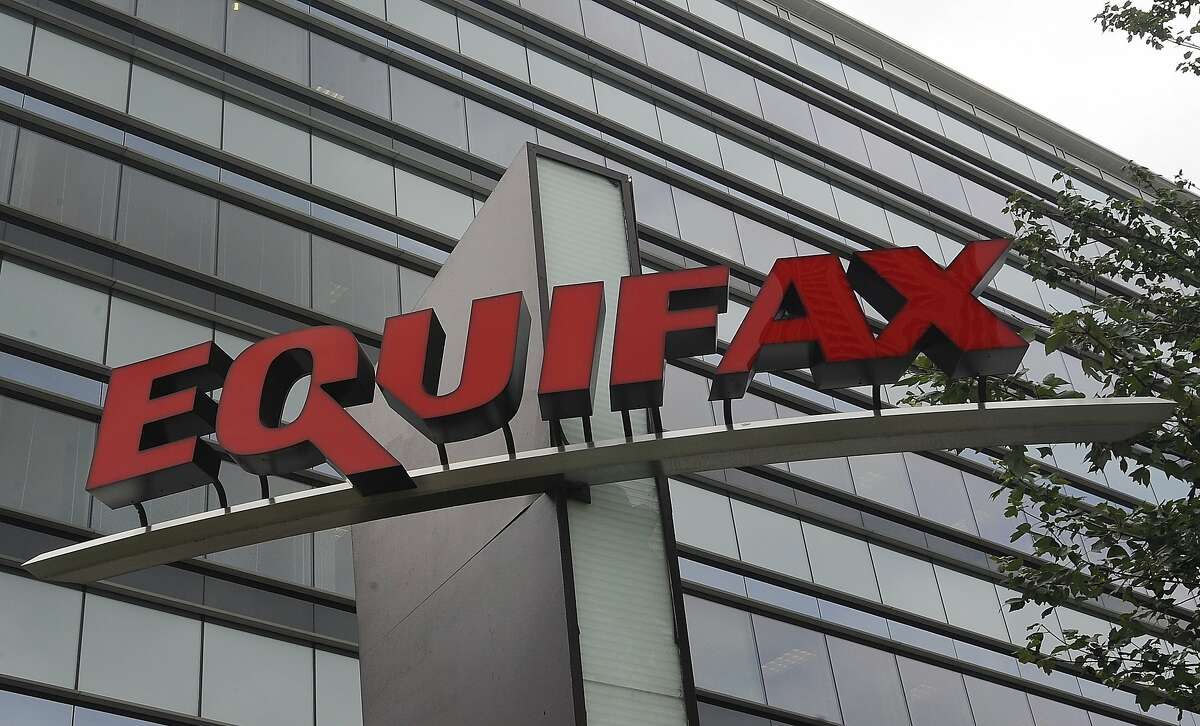 FILE - This July 21, 2012, file photo shows signage at the corporate headquarters of Equifax Inc., in Atlanta. Equifax will pay up to $700 million to settle with the Federal Trade Commission and others over a 2017 data breach that exposed Social Security numbers and other private information of nearly 150 million people. The proposed settlement with the Consumer Financial Protection Bureau, if approved by the federal district court Northern District of Georgia, will provide up to $425 million in monetary relief to consumers, a $100 million civil money penalty, and other relief. (AP Photo/Mike Stewart, File)