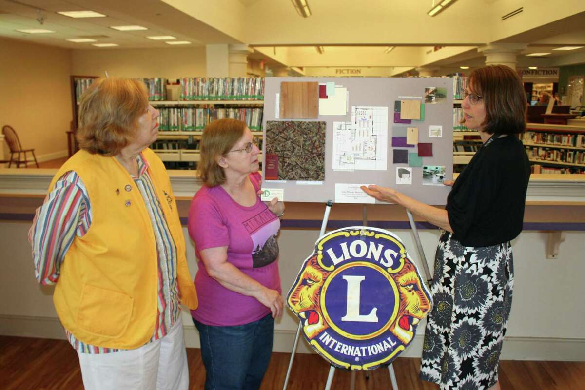 Photo left to right: Monroe Lions Club President: Adria Perlman; Friends of the Edith Wheeler Memorial Library President: Lorraine Riedel; Library Director: Lorna Rhyins