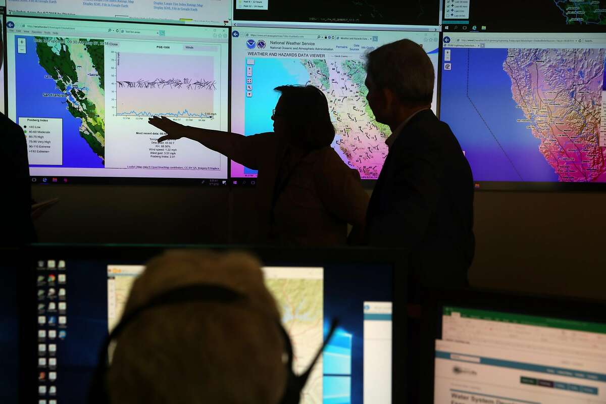 Evermary Hickey, Director of Emergency Preparedness and Response, and Kevin Dasso, PG&E Vice President Electric Asset Management, at PG&E's Wildfire Safety Operations Center in San Francisco, CA on Monday, May 7, 2018.