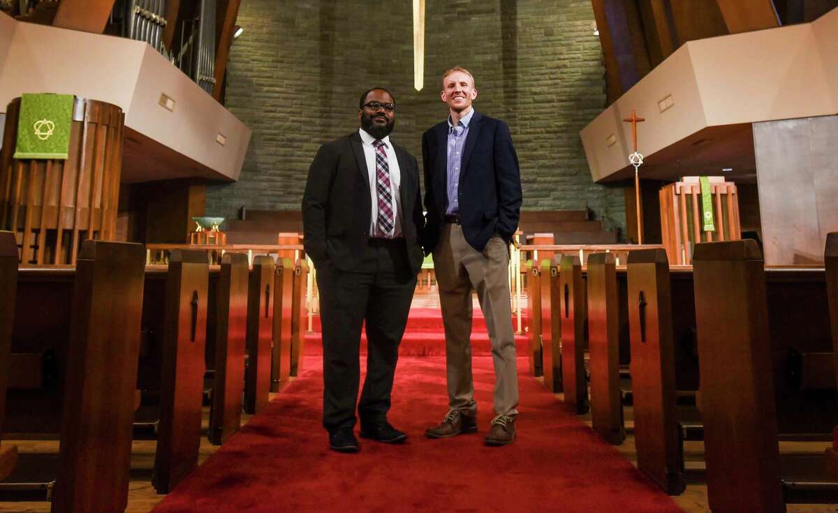 Assistant Pastor David Johnson, left, and Pastor Tommy Williams pose for a photo at Trinity United Methodist Church Monday afternoon. Photo taken on Monday, 07/15/19. Ryan Welch/The Enterprise