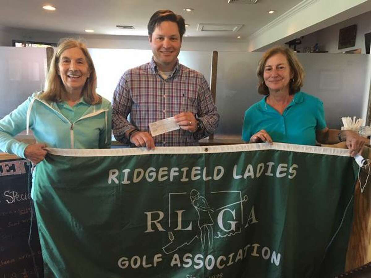 From left to right: Tony Phillips from the Ridgefield Emergency Fund and golf tournament chairs, Chris Frazee and Bonnie Harrington.