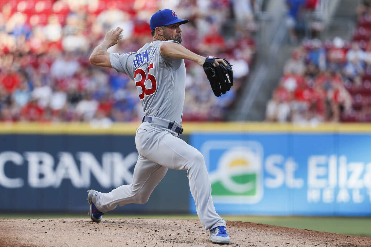 Chicago Cubs starting pitcher Cole Hamels throws during the first inning of the team's baseball game against the Cincinnati Reds, Friday, June 28, 2019, in Cincinnati. (AP Photo/John Minchillo)