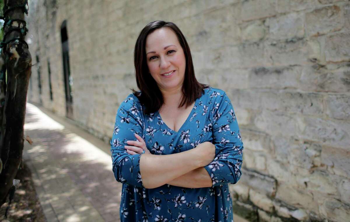 In this July 1, 2019 photo, Air Force veteran MJ Hegar poses for a photo in Round Rock, Texas. Hegar is the most significant challenger so far to Republican Sen. John Cornyn and has already raised more than $1 million. (AP Photo/Eric Gay)