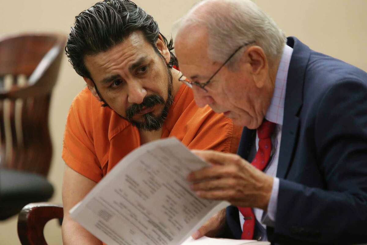 Paulo Gonzalez Chavez talks with his attorney, Charles Mais, Jr., after his sentencing hearing in the Bexar County 226th State District Court, Tuesday, July 23, 2019. He pled no contest in the murder of his girlfriend, Idalia Ceredon Becerra, 29, in December of 2017. Meza was received a 35-year sentence and was ordered to pay $6,000 in restitution for Becerra’s funeral expenses.