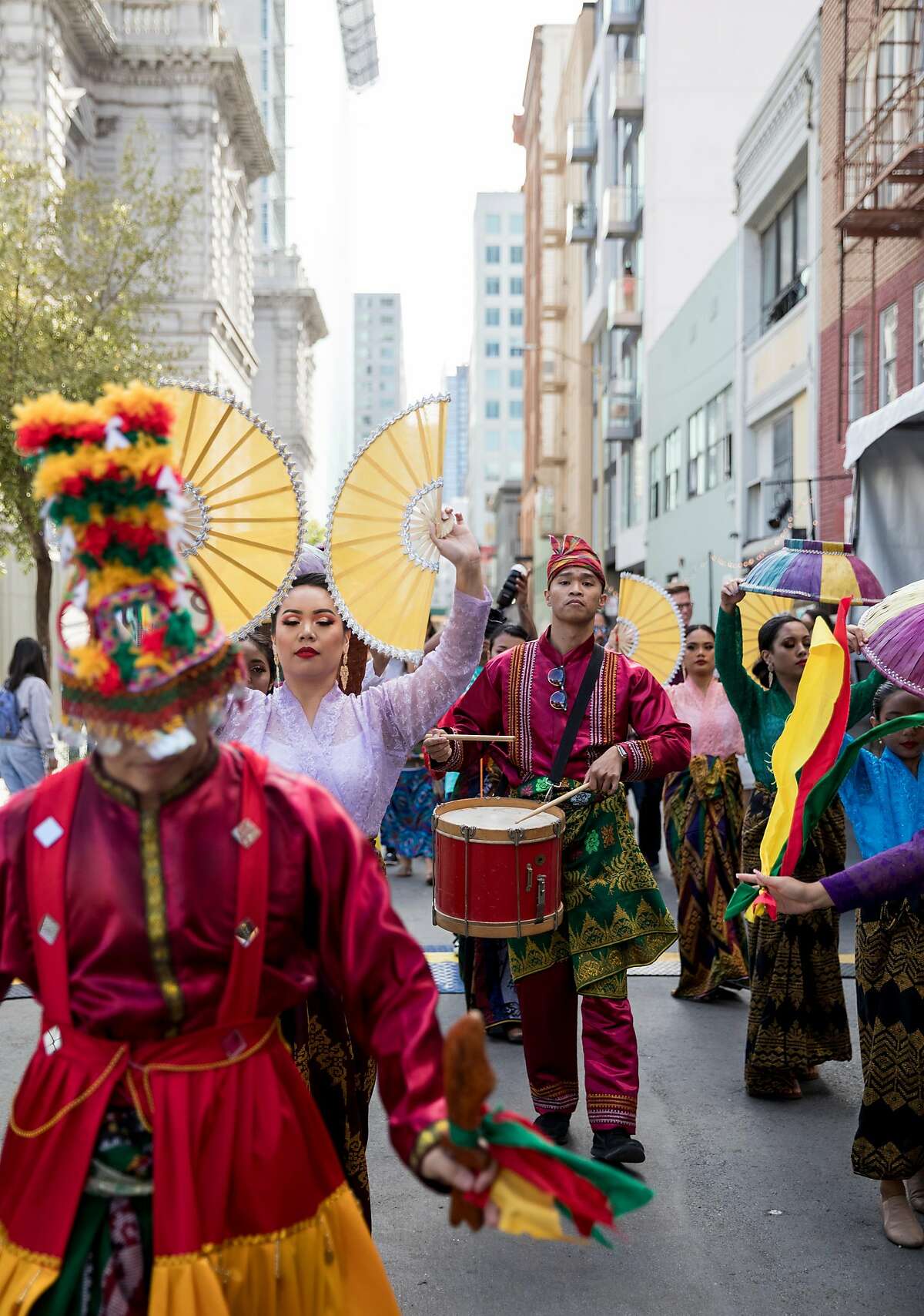Traditional Filipino indigenous cultural dancers perform during Undiscovered SF's creative night market in San Francisco, Calif. Saturday, July 20, 2019.